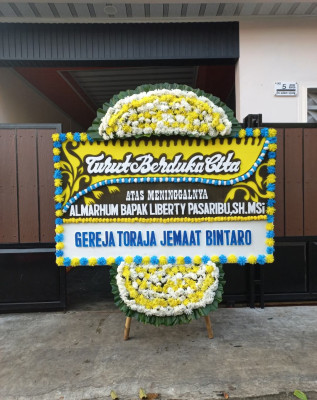 Papan Bunga Duka di Megambilis
